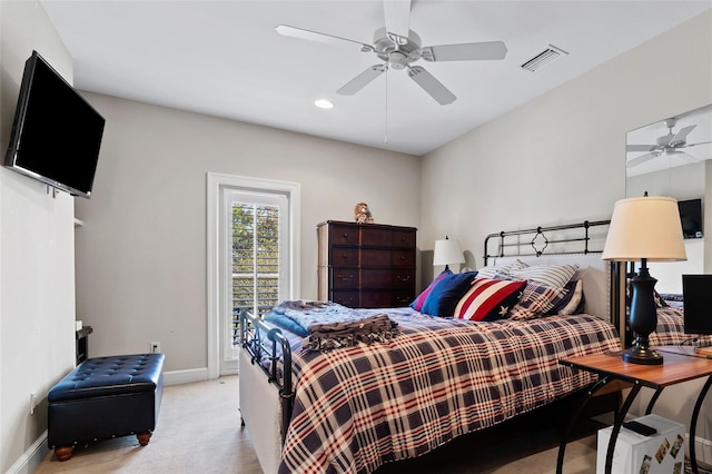 carpeted bedroom featuring ceiling fan