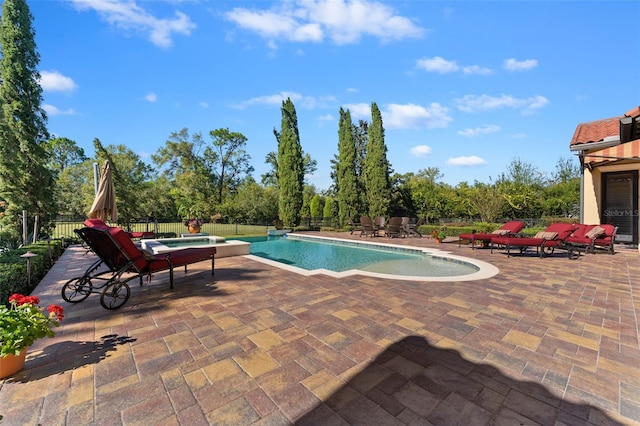 view of swimming pool with a patio area