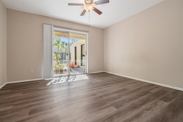 3206 W Azeele St Unit 100, Tampa, FL 33609 - empty room featuring a ceiling fan, baseboards, and dark wood-type flooring