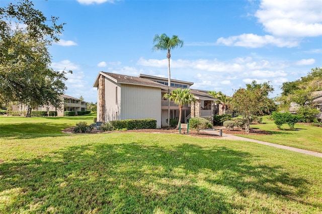 2265 Burnway Rd Unit 2265, Haines City, FL 33844 - mid-century modern home featuring a front lawn