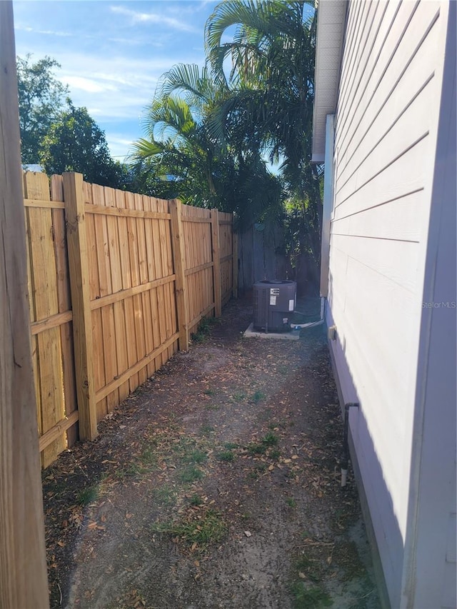 view of yard with central AC unit