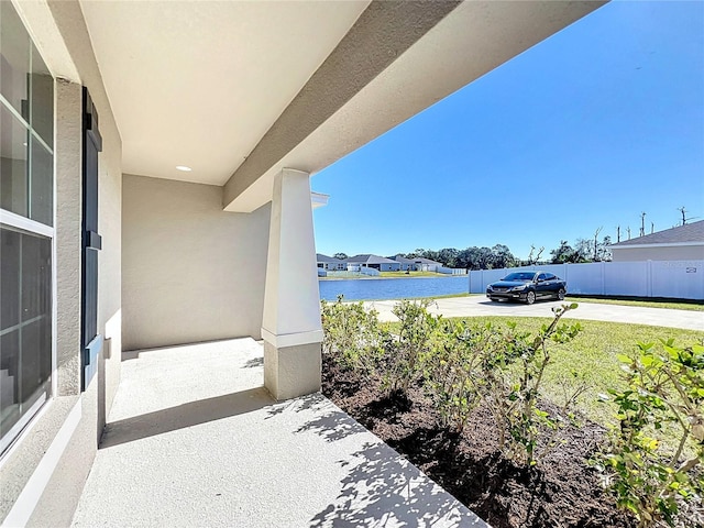 view of patio / terrace featuring a water view