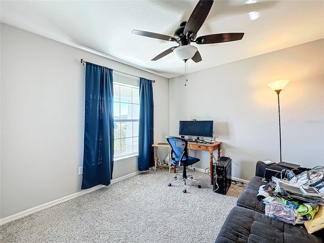 carpeted office with ceiling fan