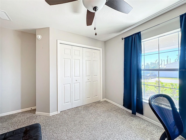 office area with carpet flooring and ceiling fan