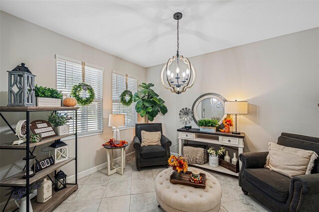 living area featuring light tile patterned floors and an inviting chandelier