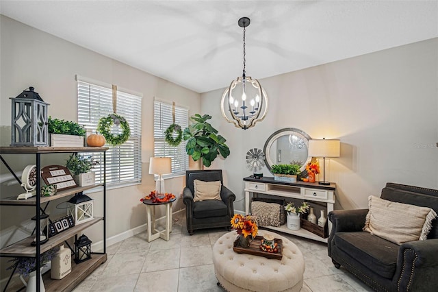 11321 Chilly Water Ct, Riverview, FL 33569 - sitting room featuring a chandelier, baseboards, and light tile patterned flooring