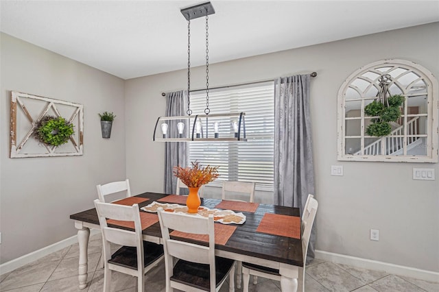 11321 Chilly Water Ct, Riverview, FL 33569 - dining room featuring baseboards and light tile patterned flooring
