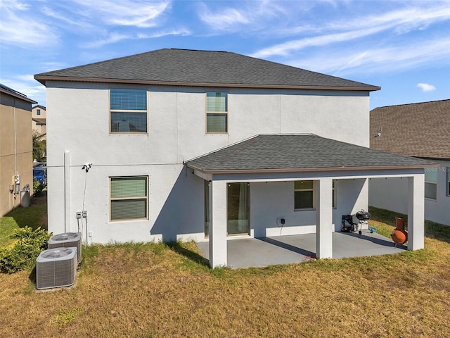 11321 Chilly Water Ct, Riverview, FL 33569 - rear view of house featuring a shingled roof, a lawn, and central AC unit