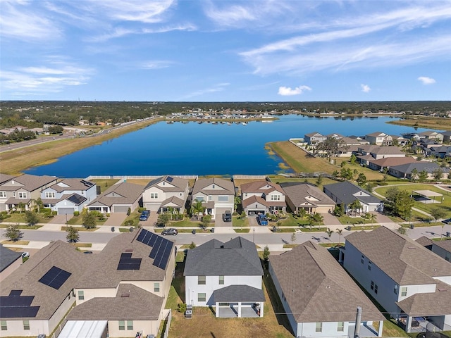 drone / aerial view with a water view