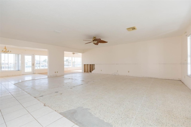 unfurnished room featuring ceiling fan