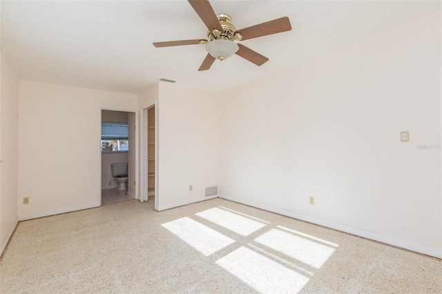 unfurnished room with ceiling fan