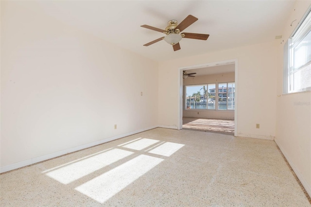 spare room featuring ceiling fan