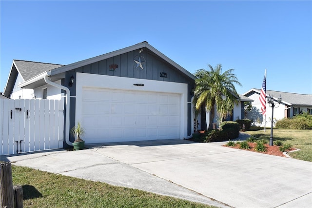 single story home featuring a garage