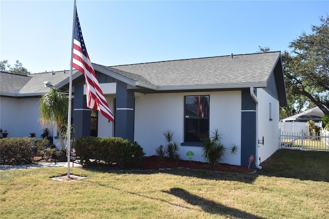 single story home with a front yard