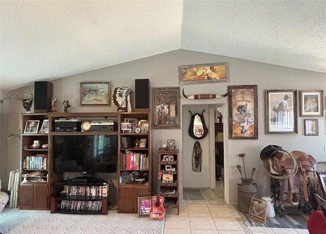 tiled living room with a textured ceiling and lofted ceiling