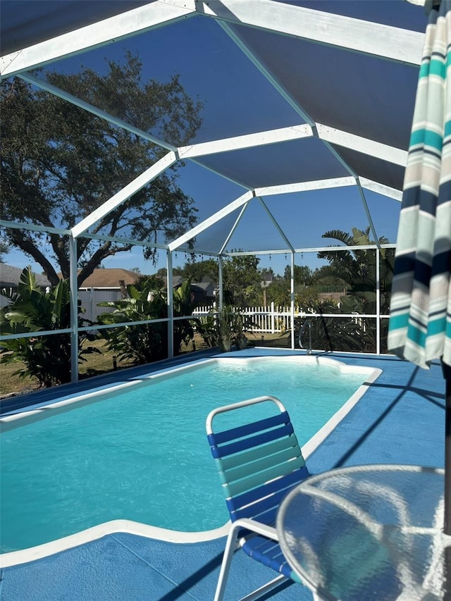 view of pool featuring a lanai