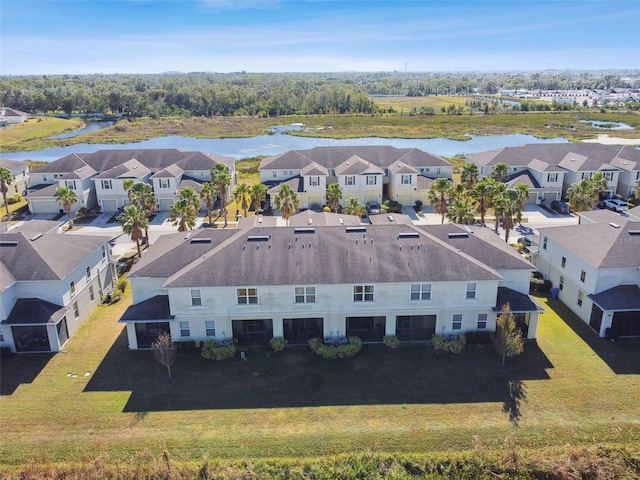 bird's eye view with a water view