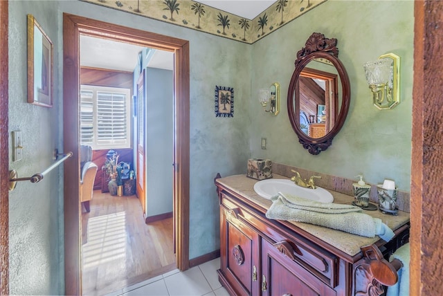 bathroom with vanity and wood-type flooring