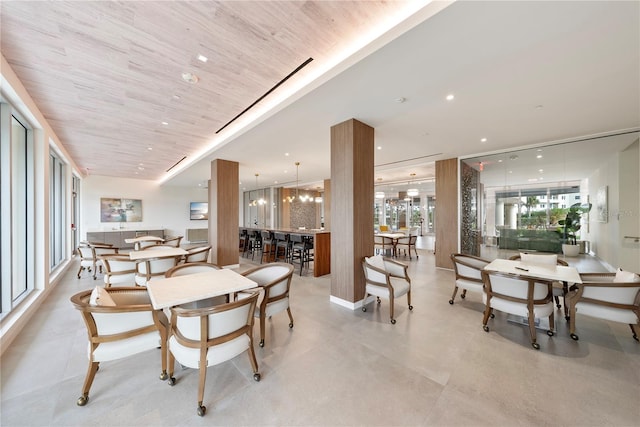 dining room featuring wood ceiling