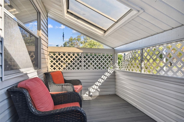 sunroom with vaulted ceiling