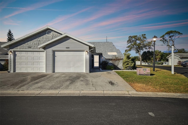 ranch-style home with a garage