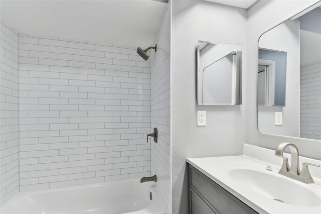 bathroom with shower / bathtub combination and vanity