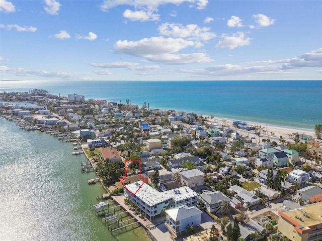 bird's eye view with a water view and a view of the beach