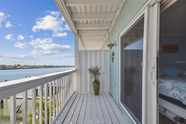 balcony featuring a water view