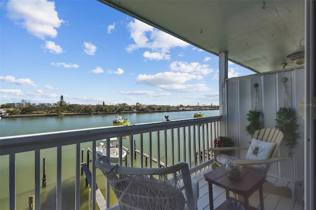 balcony featuring a water view