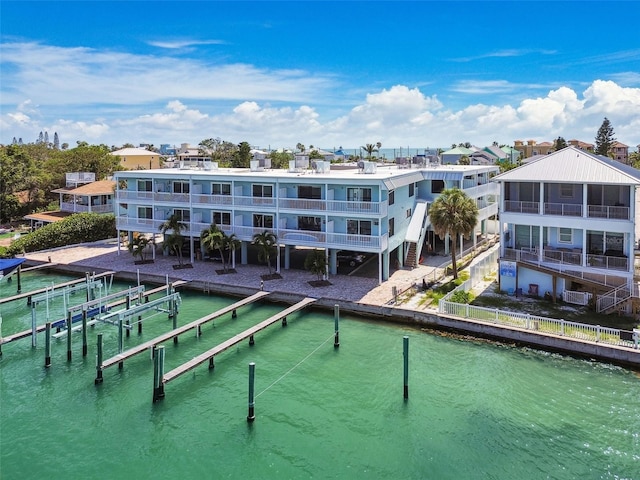 143 94th Ave Unit 2, Treasure Island, FL 33706 - dock with a water view and boat lift