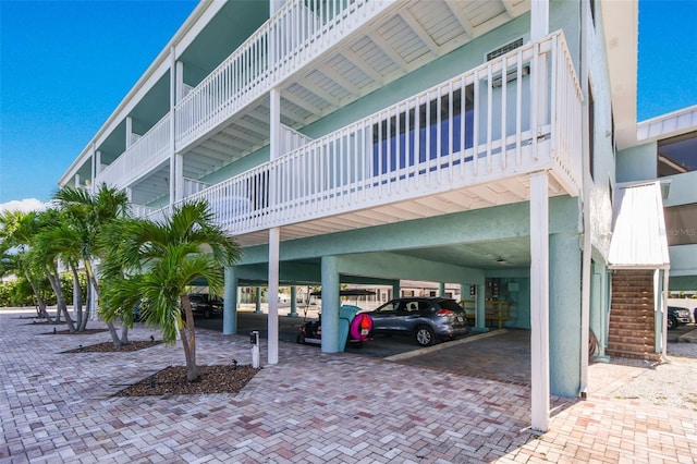 143 94th Ave Unit 2, Treasure Island, FL 33706 - view of property with a carport
