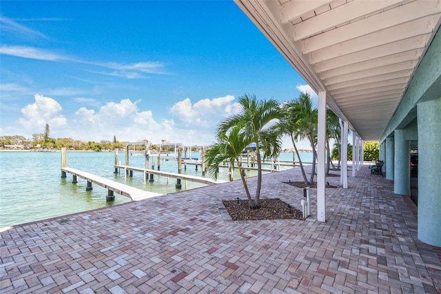 143 94th Ave Unit 2, Treasure Island, FL 33706 - dock area featuring a water view
