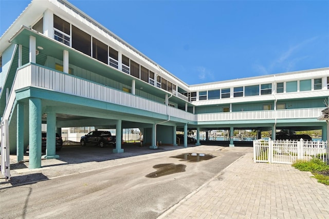 143 94th Ave Unit 2, Treasure Island, FL 33706 - view of property featuring covered parking