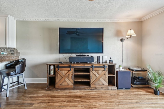 143 94th Ave Unit 2, Treasure Island, FL 33706 - living room with a textured ceiling and wood finished floors