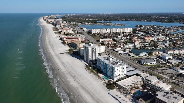 aerial view with a water view and a view of the beach