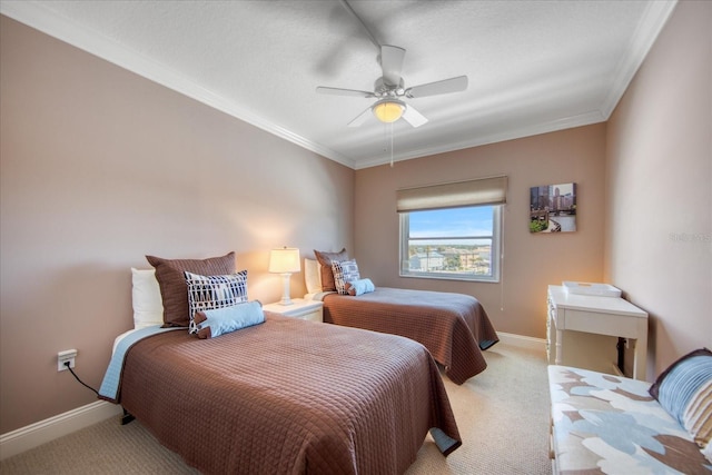 carpeted bedroom featuring ceiling fan and ornamental molding