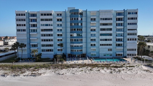 view of property with a community pool