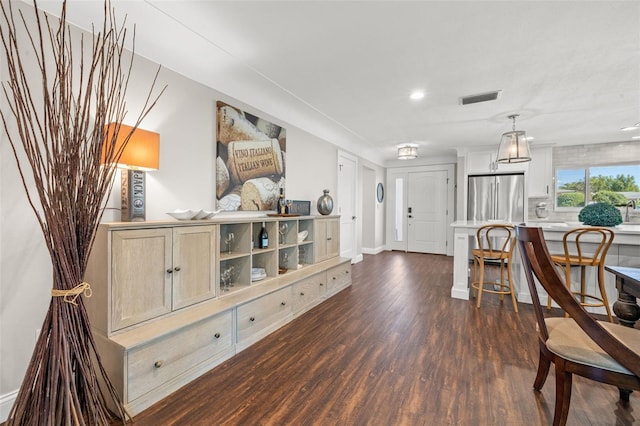 interior space with dark hardwood / wood-style flooring