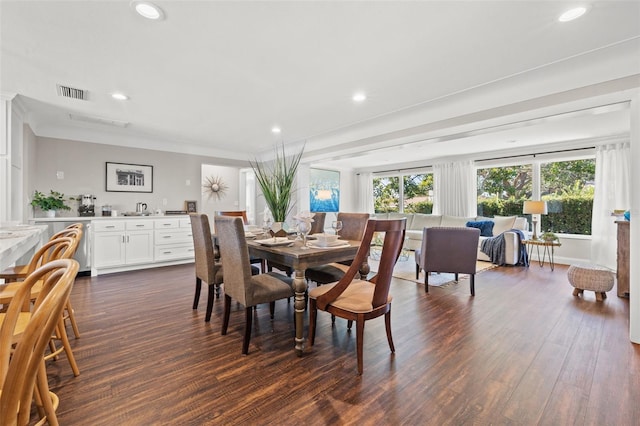 dining room with dark hardwood / wood-style floors