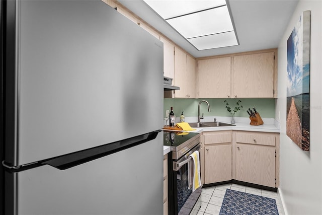 kitchen with sink, stainless steel appliances, light brown cabinets, and ventilation hood