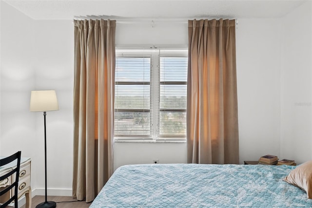 bedroom featuring hardwood / wood-style flooring