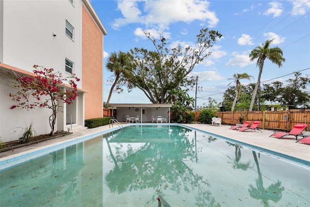 view of pool featuring a patio area