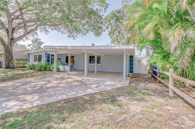 view of front of house featuring a carport