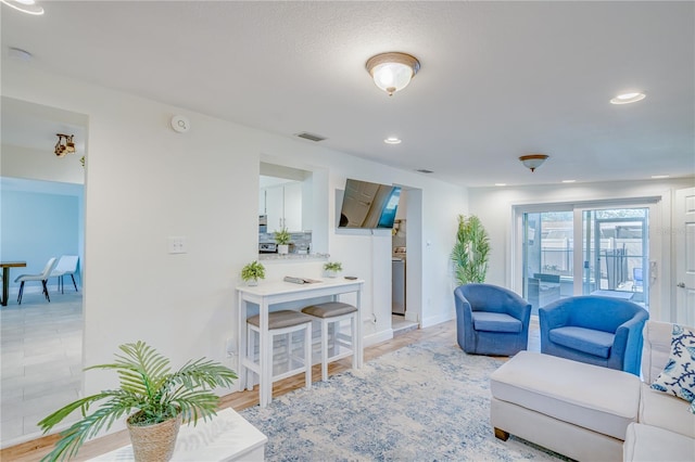 living room featuring light hardwood / wood-style flooring