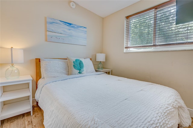 bedroom featuring light wood-type flooring