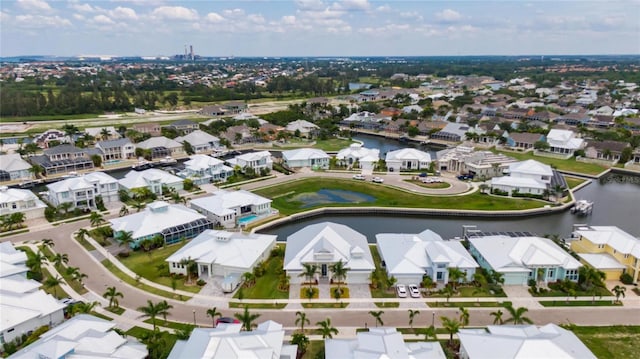 drone / aerial view with a water view