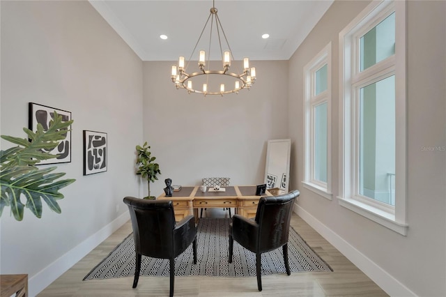 office featuring light hardwood / wood-style floors and a chandelier