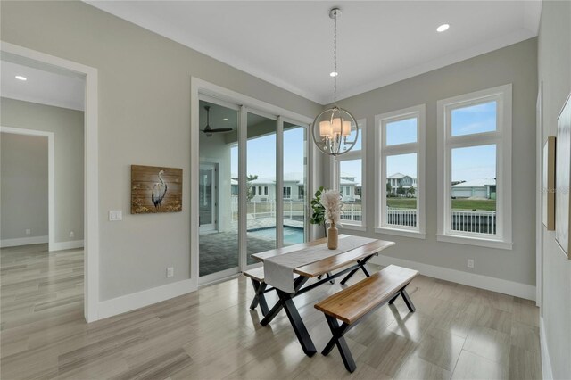 5713 Tybee Island Dr, Apollo Beach, FL 33572 - dining room with plenty of natural light, a chandelier, baseboards, recessed lighting, and light wood-type flooring