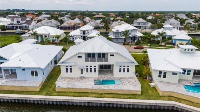 5713 Tybee Island Dr, Apollo Beach, FL 33572 - aerial perspective of suburban area featuring a large body of water and a pool area