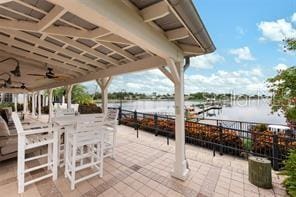 5713 Tybee Island Dr, Apollo Beach, FL 33572 - view of patio / terrace featuring a water view and ceiling fan
